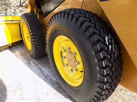 wheeled skid steer snow tires